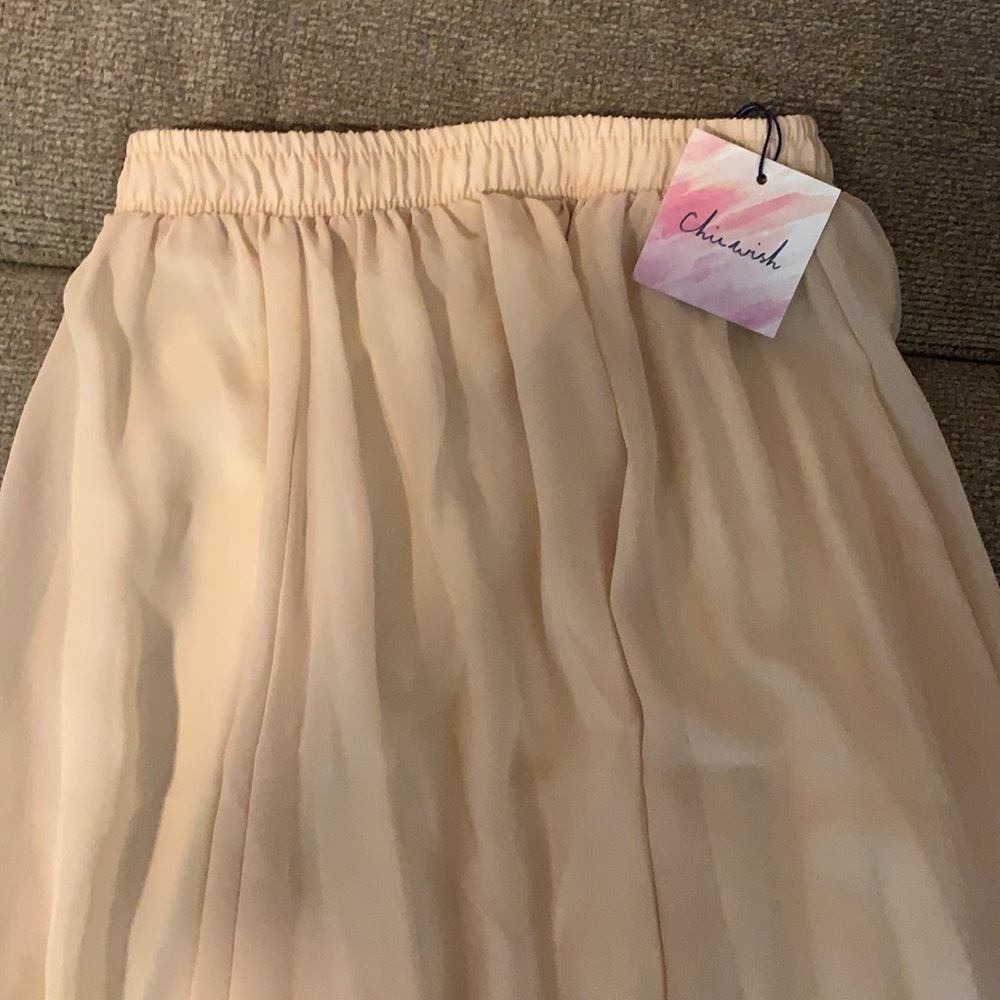 Cream chiffon skirt in perfect condition. Never worn